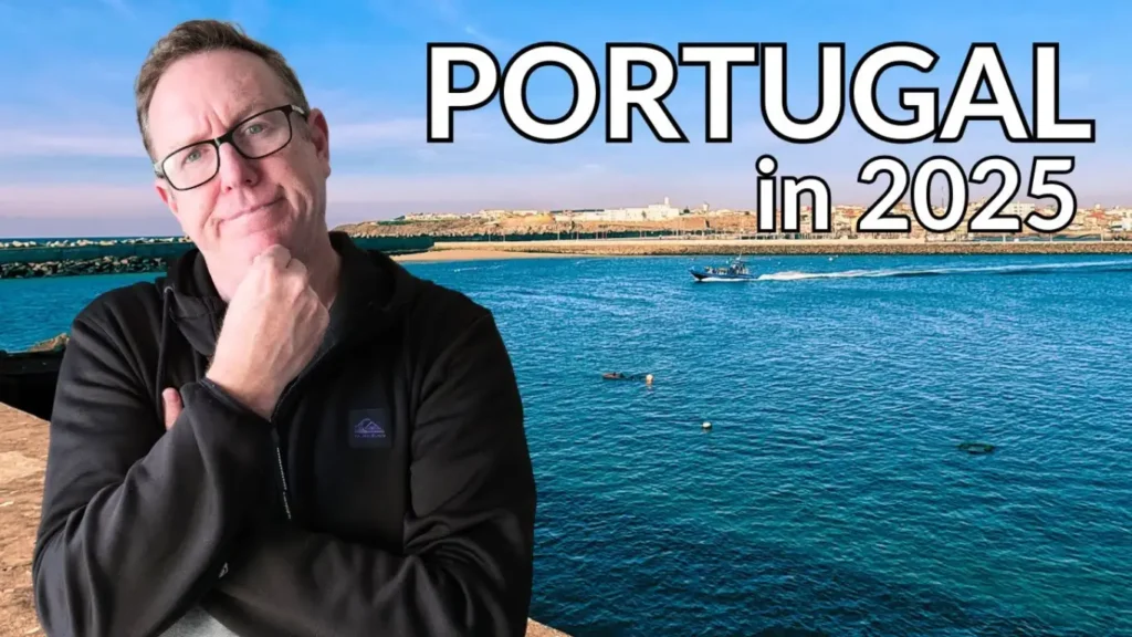 Man standing by the ocean in Portugal after relocating from the U.S. – symbolizing freedom and new beginnings abroad